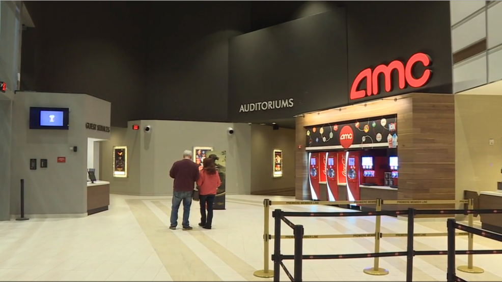 Moviegoers attend first showing at new AMC theater in downtown