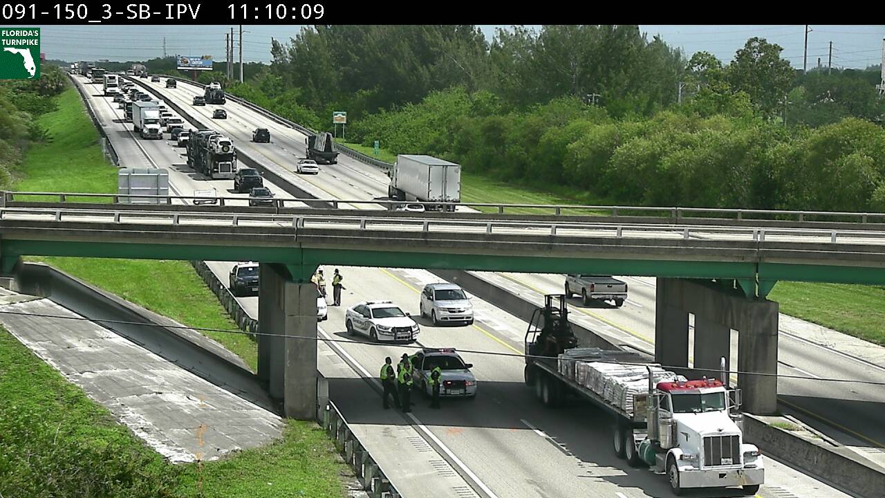 Woman jumps from overpass, blocks Turnpike near Fort Pierce WTVX