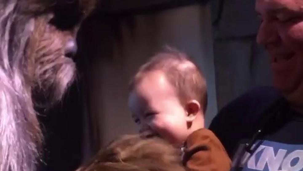 Baby giggles with Chewbacca at Disney World poster_3a778b75c96c46d2a4bd9056b414f1d5.jpg